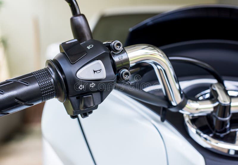 Motorcycle handlebar horns,turn signal,high-low front light button stock image Motorcycle handlebar horns,turn signal,high-low front light button stock image