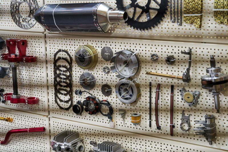 https://thumbs.dreamstime.com/b/motorcycle-parts-accessories-wall-144438617.jpg