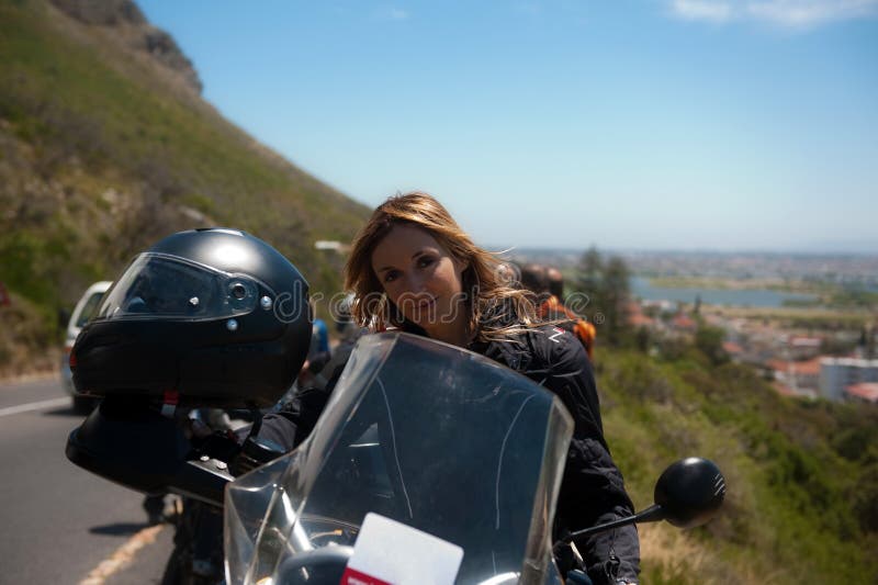 A motorcycle portrait of a beautiful woman.