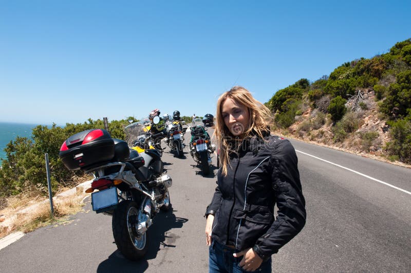 A motorcycle portrait of a young woman.