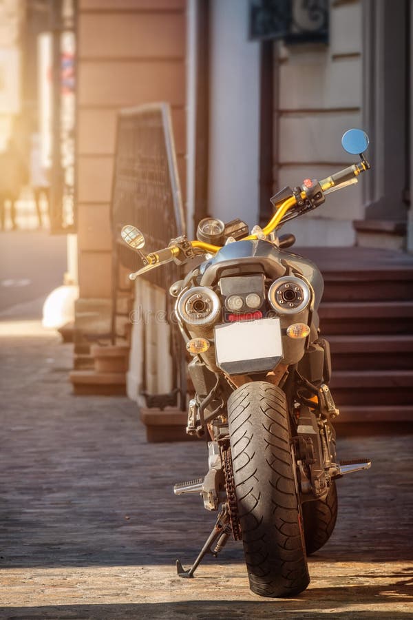 A Rear View Of A Motorcycle Stock Image Image of roadway, engine