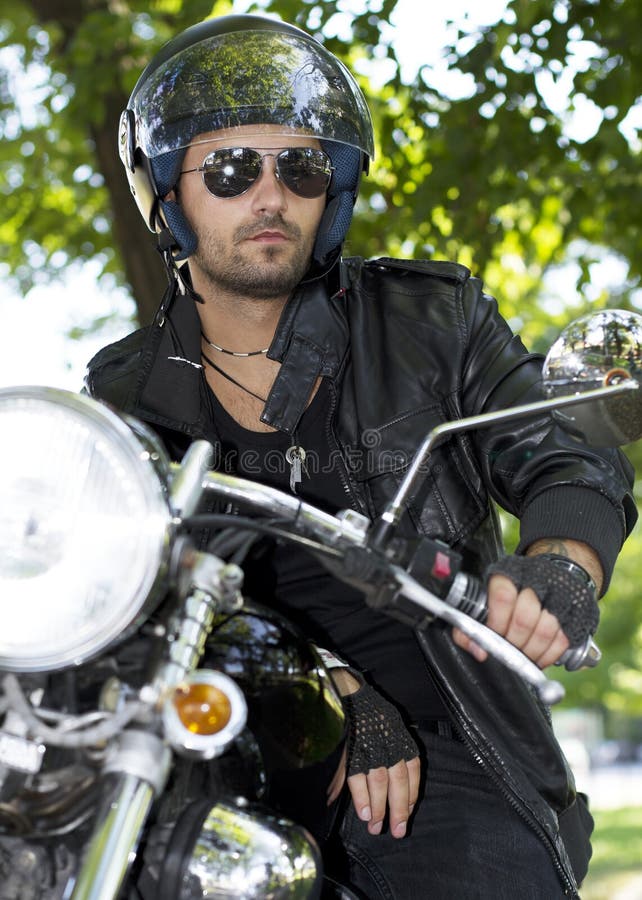 Motorcycle rider with helmet royalty free stock photos