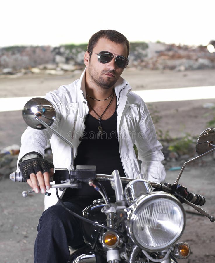 Motorcycle rider with sunglasses stock images
