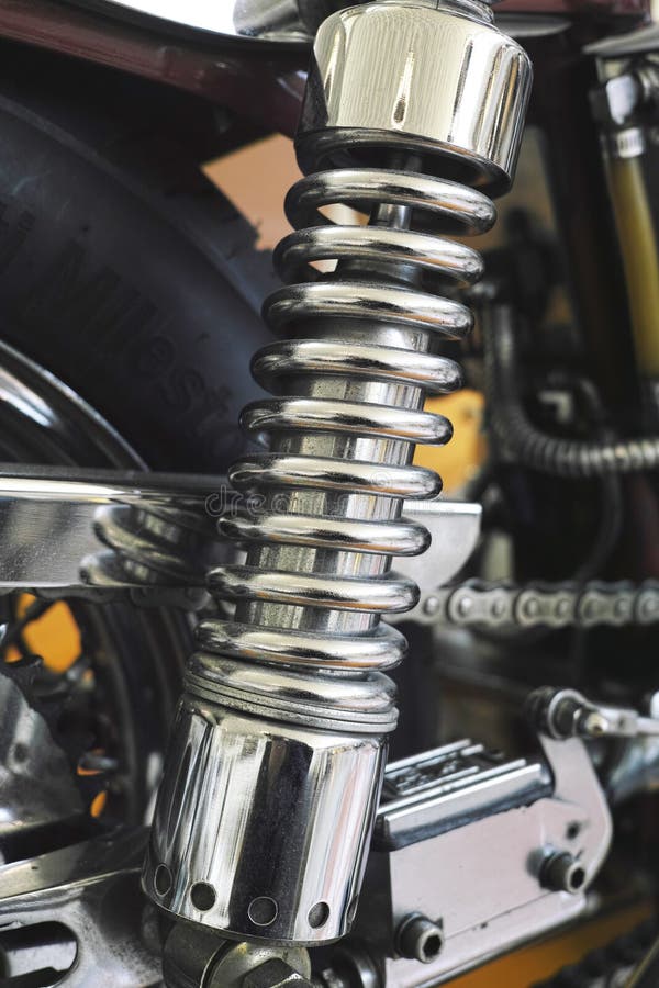 Shock absorber of motor bike with wheel hi-res stock photography