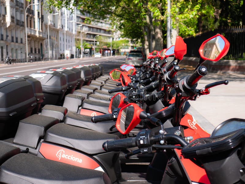 Motorcycles of the company Acciona Motosharing parked on a street in Madrid due to a temporary stoppage of the mobility service