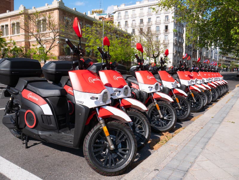 Motorcycles of the company Acciona Motosharing parked on a street in Madrid due to a temporary stoppage of the mobility service