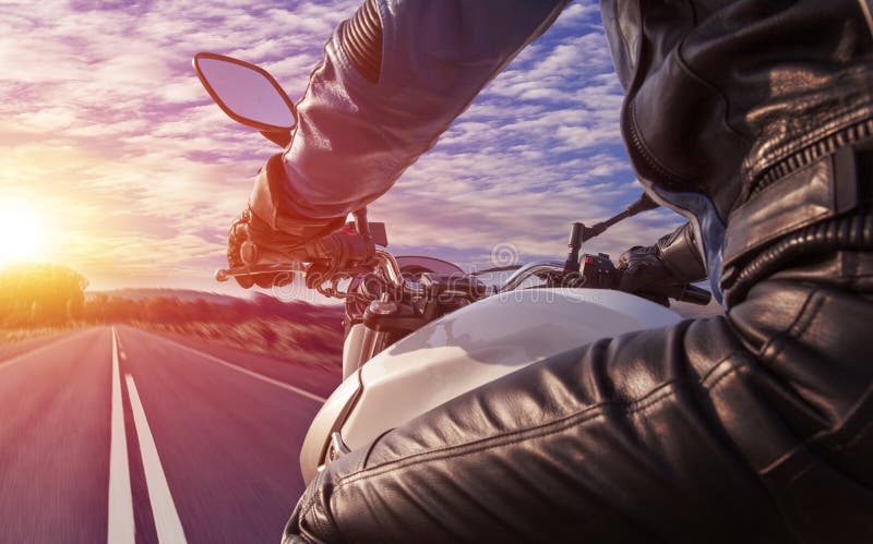 Motorcycle at night riding on country road stock photography Motorcycle at night riding on country road stock photography