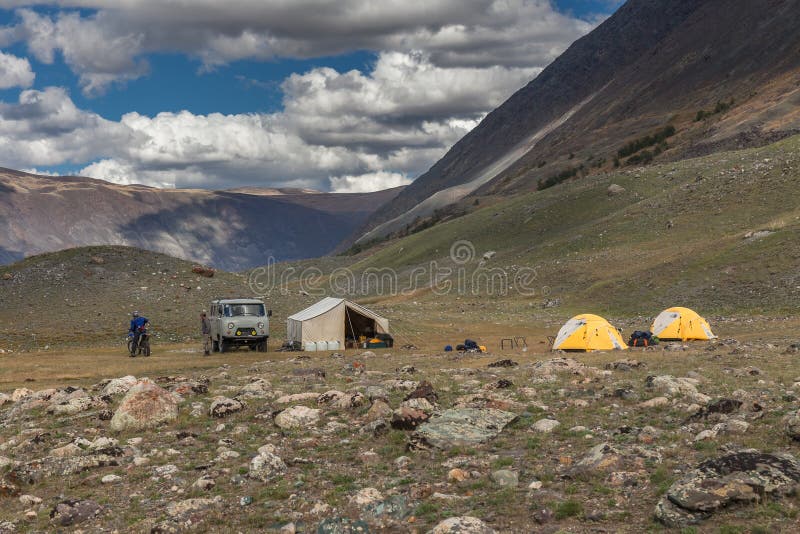 Motorcyclist near tourist camping on the Mongolian steppes, Altai. Motorcyclist near tourist camping on the Mongolian steppes, Altai.