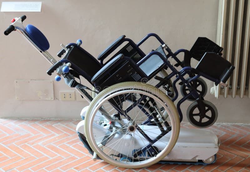 Motorized Wheelchair To Climb Stairs for the Disabled Stock Image