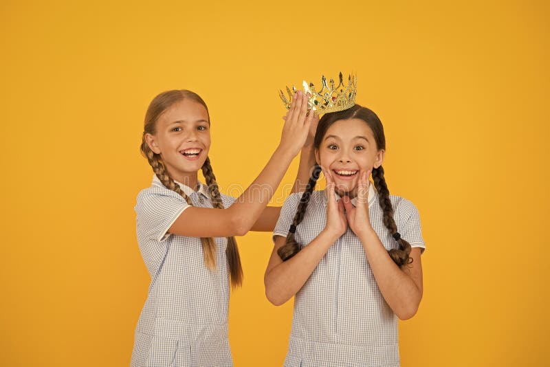 Motivation to be the best. small egoist girls imagine they are princess. success reward. happy childhood frienship. retro look of selfish kids. vintage girls in gold crown. Beauty is not enough. Motivation to be the best. small egoist girls imagine they are princess. success reward. happy childhood frienship. retro look of selfish kids. vintage girls in gold crown. Beauty is not enough.