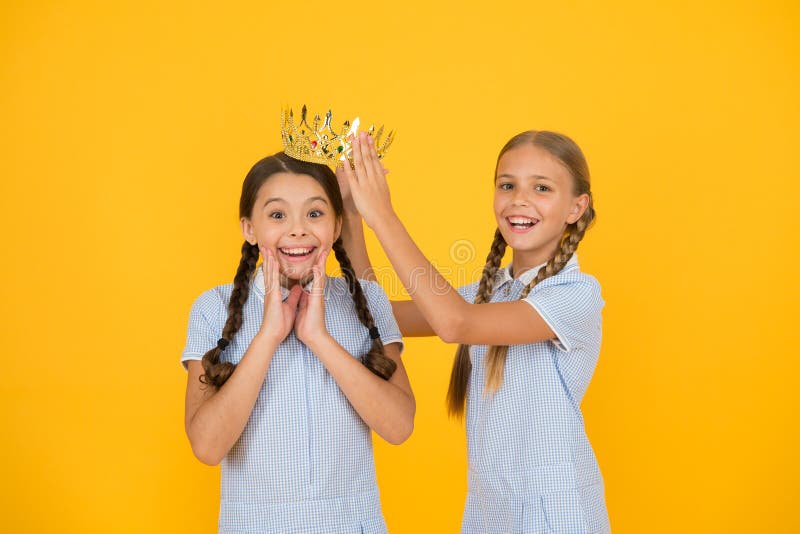 Motivation to be the best. small egoist girls imagine they are princess. success reward. happy childhood frienship. retro look of selfish kids. vintage girls in gold crown. Beauty is not enough. Motivation to be the best. small egoist girls imagine they are princess. success reward. happy childhood frienship. retro look of selfish kids. vintage girls in gold crown. Beauty is not enough.