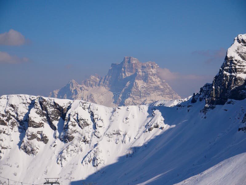Mount Pelmo over a snowy ridge