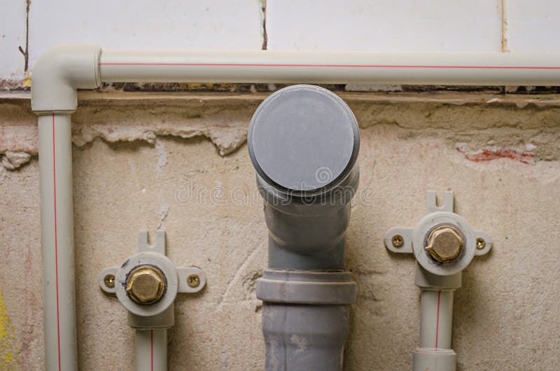 Mount pipe on wall stock photo. Image of piping, installation 72095684