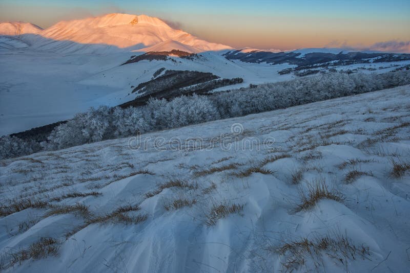 Mount Vettore at sunset, winter day with snow, Sibillini mountains NP, Umbria, Italy