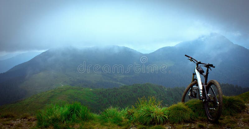 Mountain Bike on the Mountain Cloudy Background. Mountain Bicycle Concept  Wallpaper Stock Image - Image of carpathian, bike: 193143377