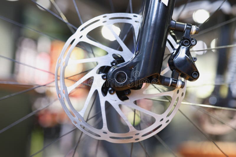 Mountain bike front wheel with mechanical disc brake closeup