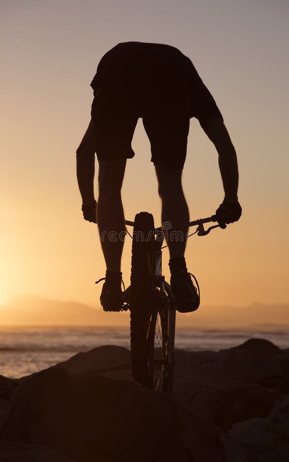 Mountain bike rider and sunset South Africa stock photo Mountain bike rider and sunset South Africa stock photo