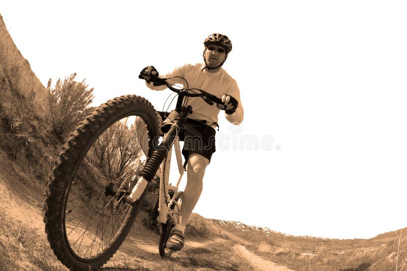 Mountain Biking stock image. Image of helmet, frame, seat 26542887