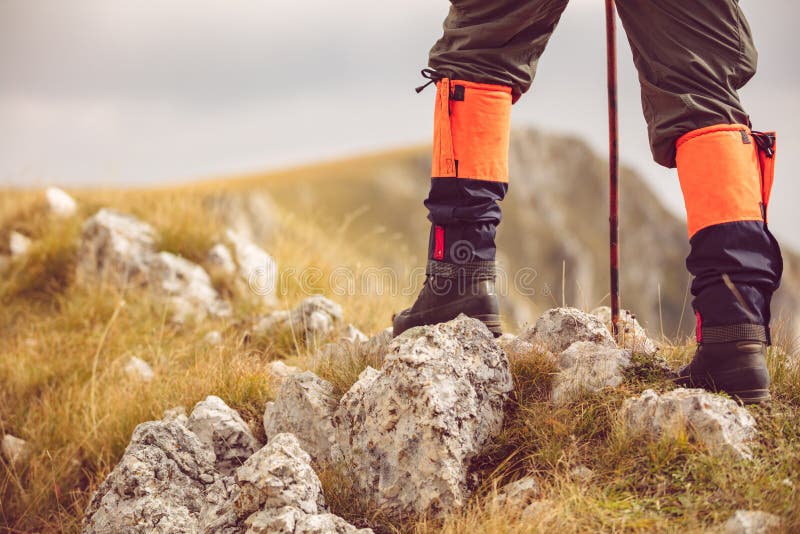 Mountain hiking. Lens flare, shallow depth of field.