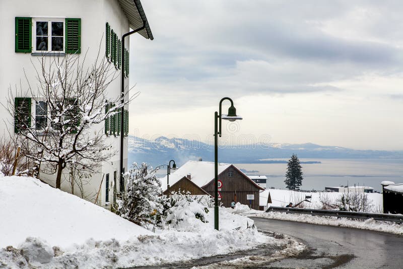 Mountain, houses, road the mountains in the Alps on a Sunny day stock photos Mountain, houses, road the mountains in the Alps on a Sunny day stock photos