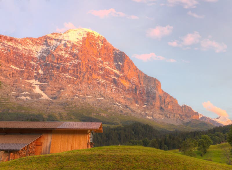 Mountain hut with alpenglow, Switzerland