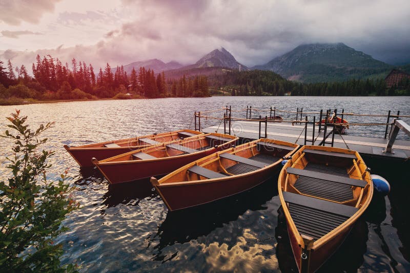 Mountain lake and empty boats in National Park High Tatra