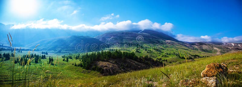 Mountain landscape. Photo of beautiful mountain landscape, natural background, blue sky with bright sun light, fresh air, green pasture valley in Lebanon stock image Mountain landscape. Photo of beautiful mountain landscape, natural background, blue sky with bright sun light, fresh air, green pasture valley in Lebanon stock image