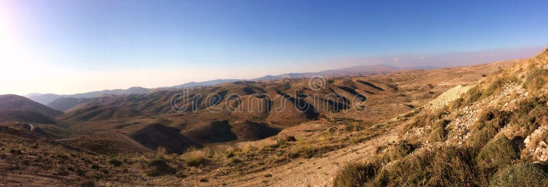 Mountains landscape and village during fall in mount lebanon, Desertic landscape on the site where there used to be cedar forest, near Faraya  Natural landscape lebanon, summits, wilderness, desertic, brown, wide, spacefull, Faraya. Mountains landscape and village during fall in mount lebanon, Desertic landscape on the site where there used to be cedar forest, near Faraya  Natural landscape lebanon, summits, wilderness, desertic, brown, wide, spacefull, Faraya