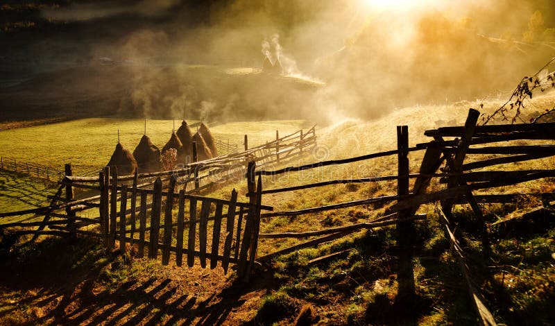 Mountain landscape with autumn morning fog at sunrise - Fundatura Ponorului, Romania