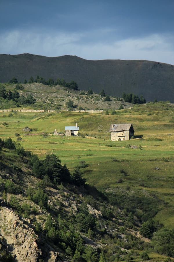 Mountain landscape by cloudy summer