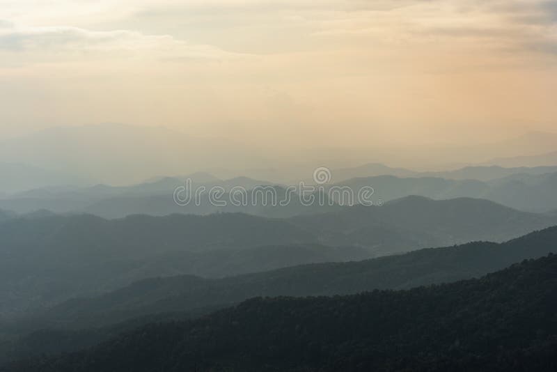 Mountain landscape , mountain layer at the Northern of Thailand dark and soft yellow tone