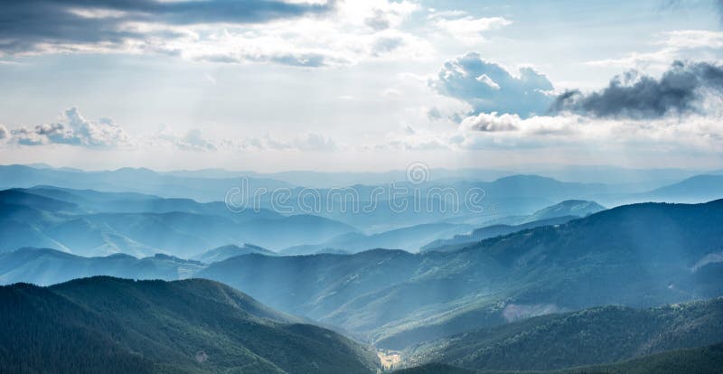 Mountain landscape with sun beams