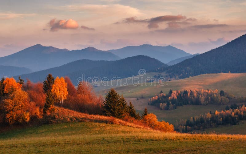 Mountain landscape at sunset in autumn.