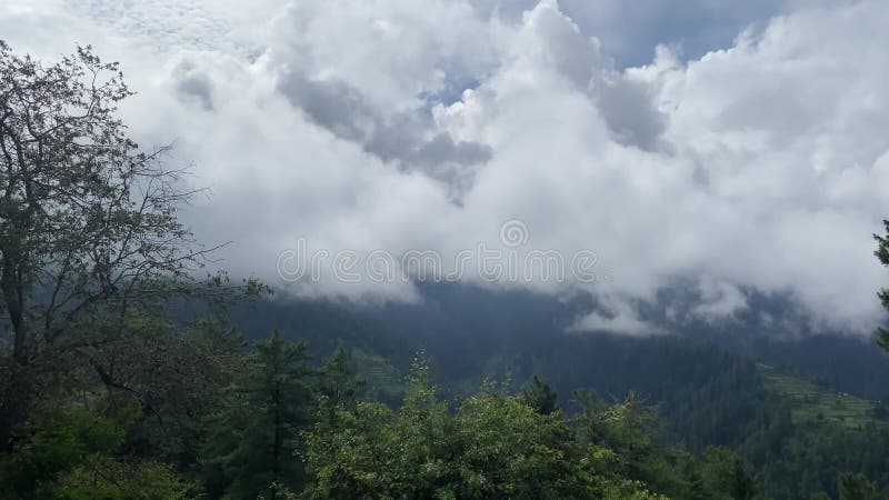 Mountain landscape timelapse moving clouds in Shogran Valley stock video