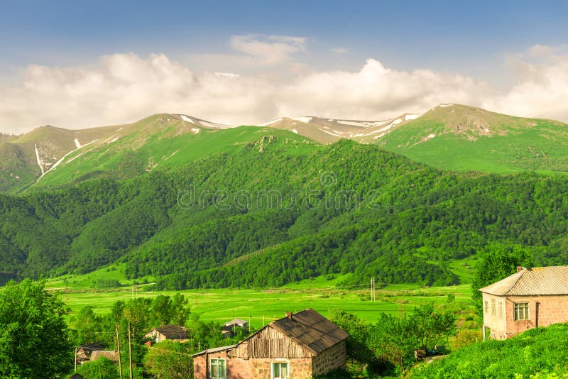 Snow Green And Peaks Stock Photo Image Of Grass Clouds 143526526