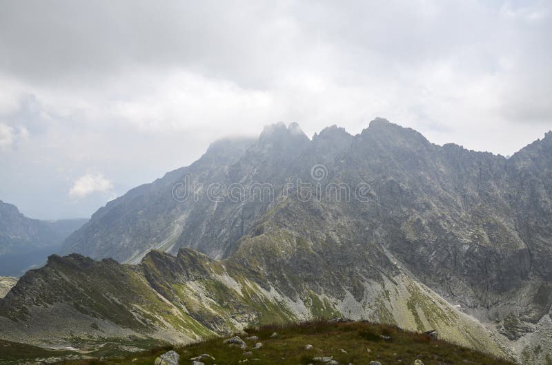 Mountain peaks, clouds and fog. High Tatras Mountains in Slovakia