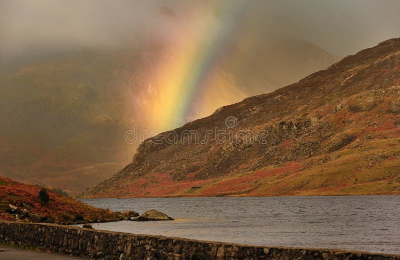 Mountain rainbow, Snowdonia, Wales stock photography