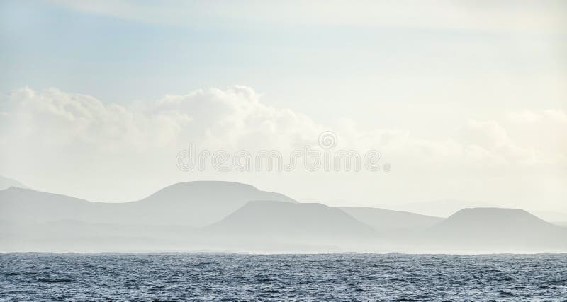 Mountain Range In Mist In The Background And The Atlantic Ocean Stock Photo - Image of scenery