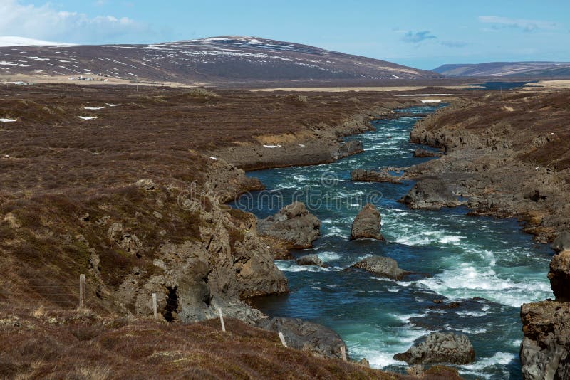 mountain river overlooking the snowy mountains, Iceland royalty free stock image mountain river overlooking the snowy mountains, Iceland royalty free stock image