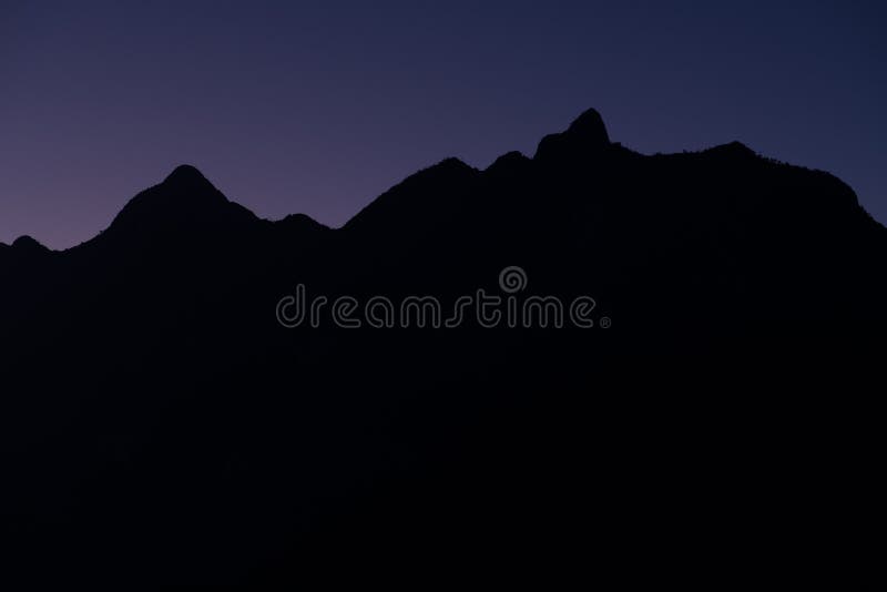 Mountain silhouette violet sky before sunrise royalty free stock image Mountain silhouette violet sky before sunrise royalty free stock image