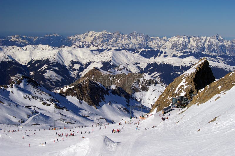 Mountain ski slope glacier austria with skiers