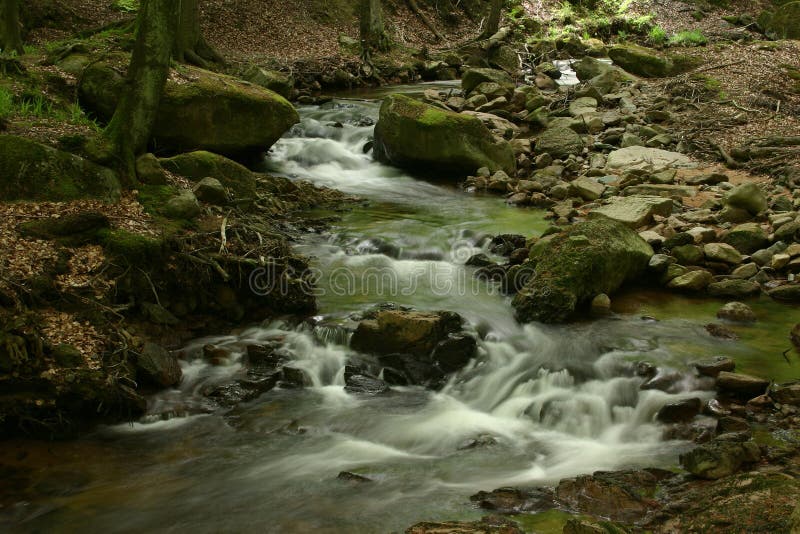 Mountain stream stock photos
