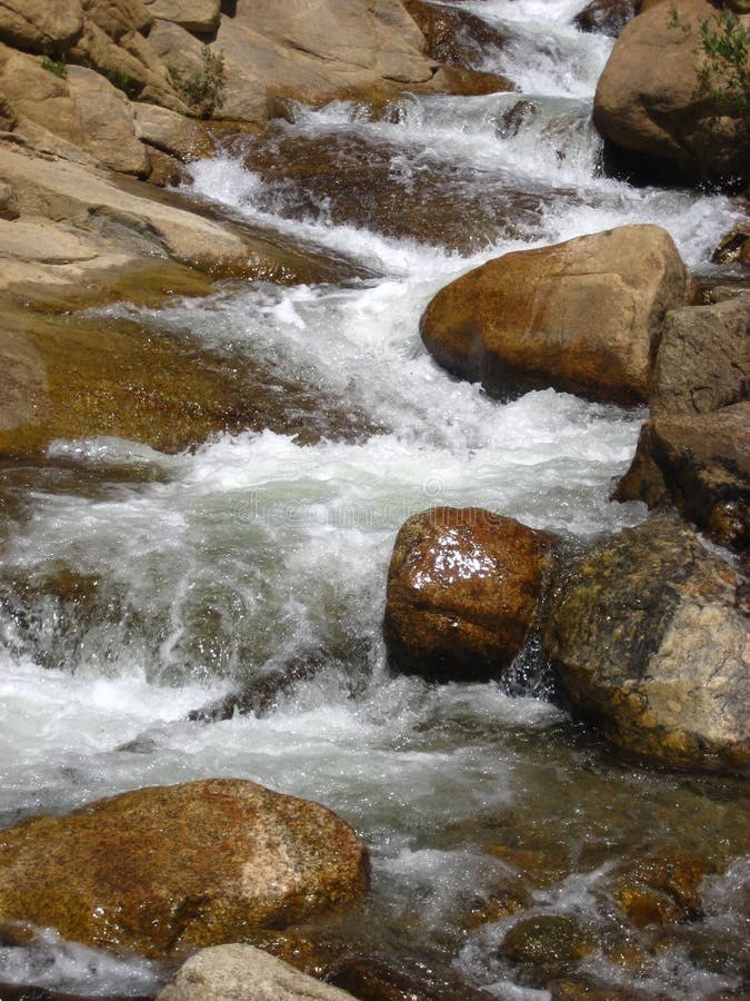 Mountain stream with rocks. A white water stream with cascades over the rocks. Location is Rocky Mountain National Park, Colorado stock photos Mountain stream with rocks. A white water stream with cascades over the rocks. Location is Rocky Mountain National Park, Colorado stock photos