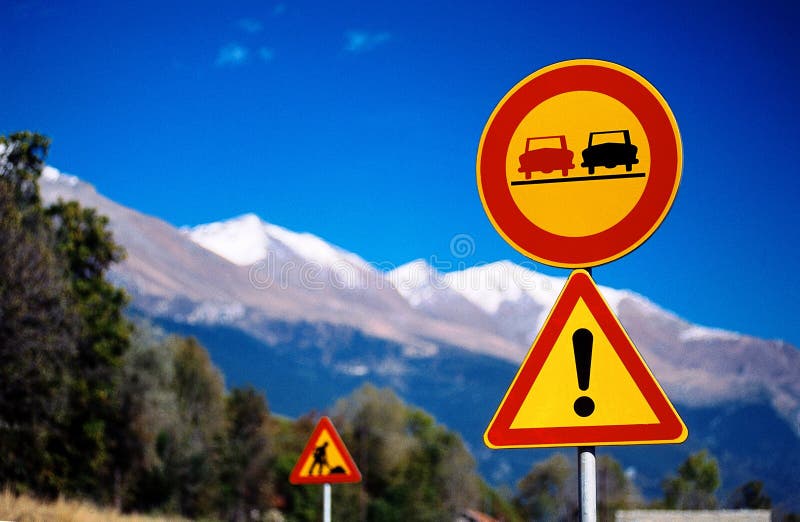 Dangerous turns, warning traffic sign isolated on white background Stock  Photo - Alamy