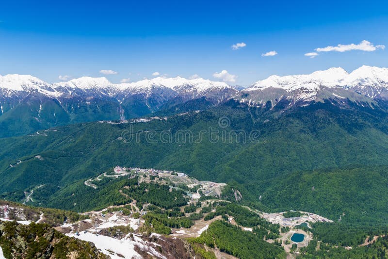 Mountain valley with snow-capped mountain peaks. height 2320 above sea level Esto-Sadok Russia Sochi