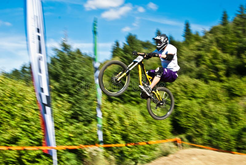 Mountainbiker Jumping - in Motion Blurr Editorial Image - Image of fast ...
