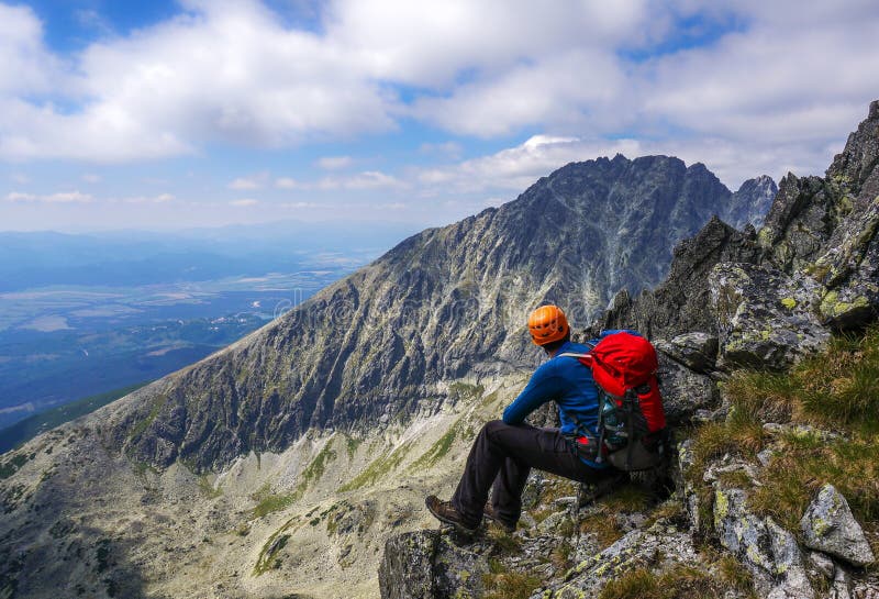 Mountaineer man enjoying the landscape