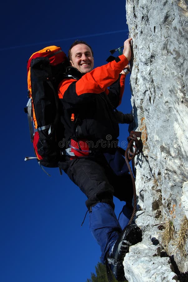 Mountaineer rock climbing stock images