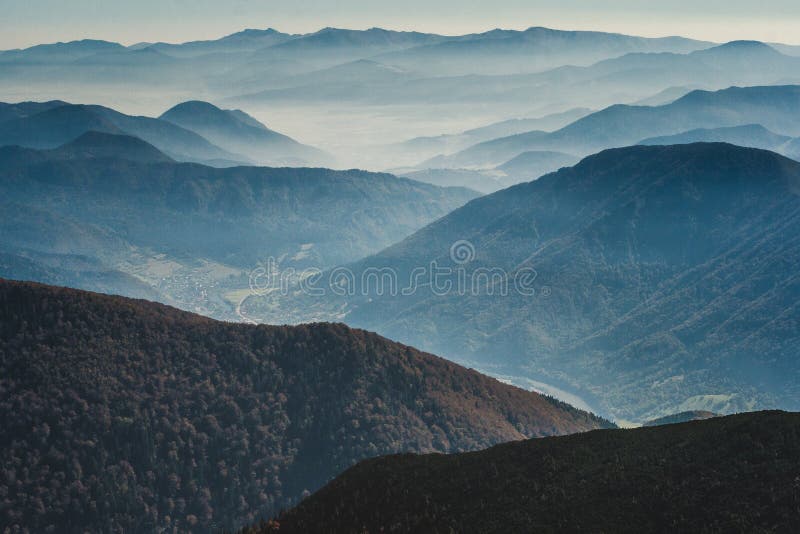 Mountainous country with valleys.