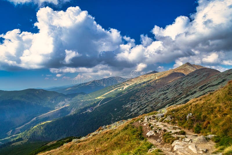 Mountainous landscape with hills and valleys in autumn season